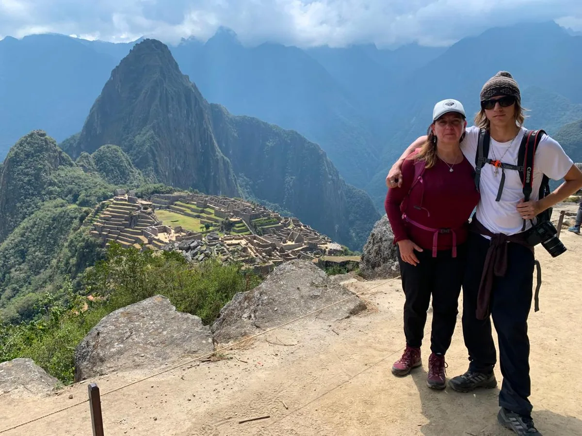 A local guide overlooking Machu Picchu in Peru